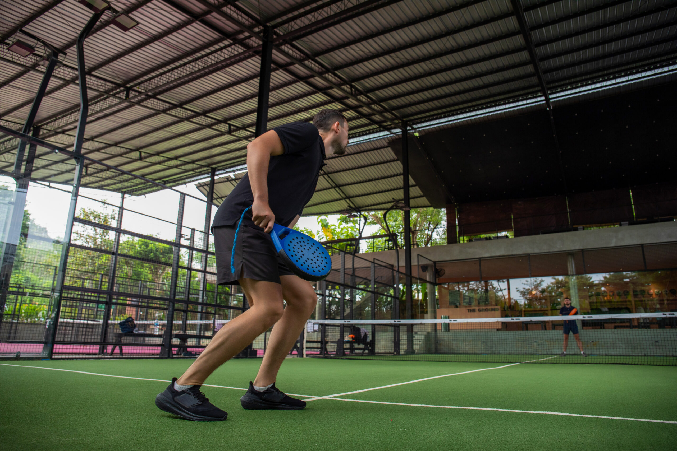Padel players on a court